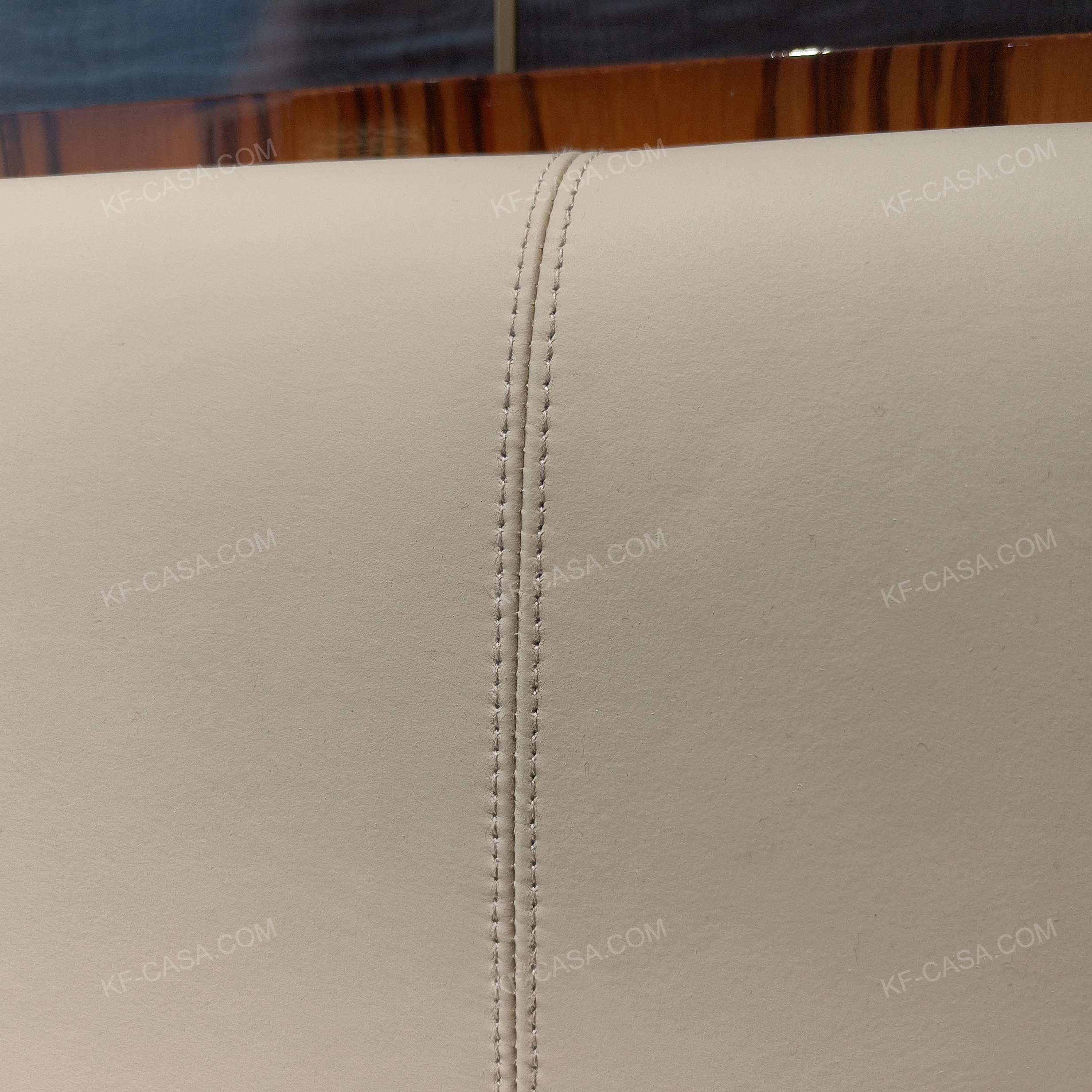 Soft Beige Upholstered Bed with Natural Wood Veneer Trim & Integrated Ambient Lighting